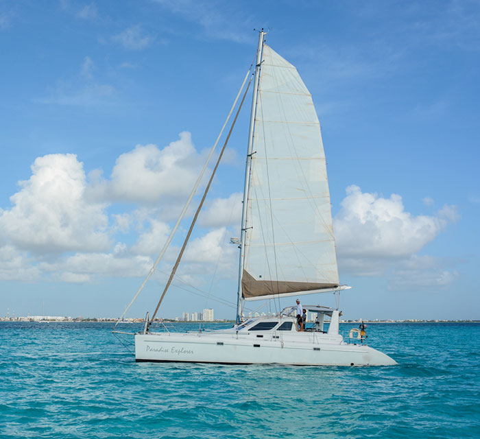 side view of paradise explorer sailing charters in cancun and isla mujeres, mexico