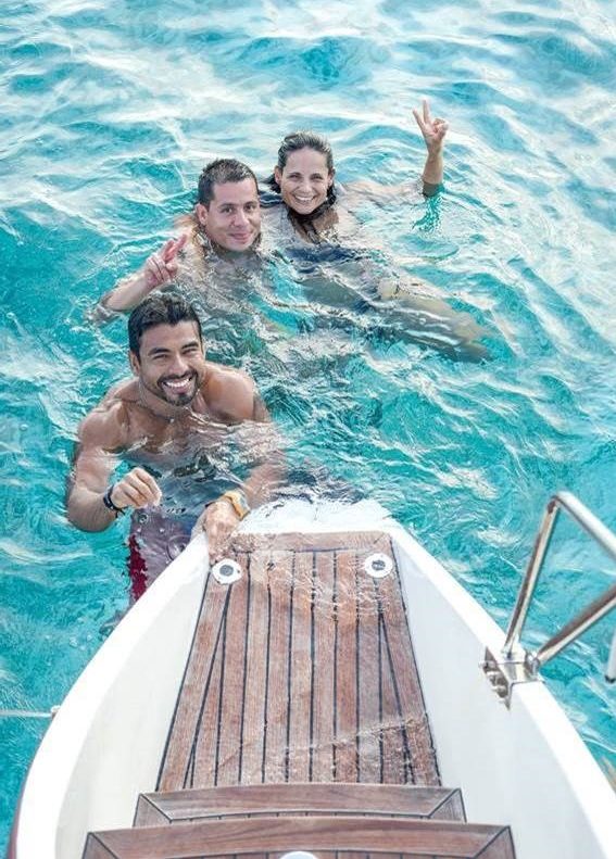 people swimming during ap rivate catamaran tour in riviera maya, mexico