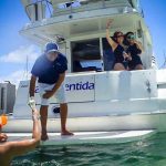 girls taking selfie in luxury tour onboard a private yacht in playa del carmen, puerto aventuras and cozumel, all in riviera maya, mexico