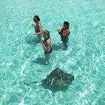 women and sea ray in cozumel tour onboar a private catamaran charter