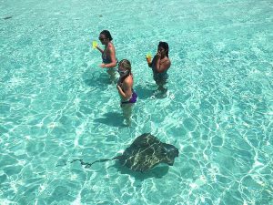 women and sea ray in cozumel tour onboar a private catamaran charter