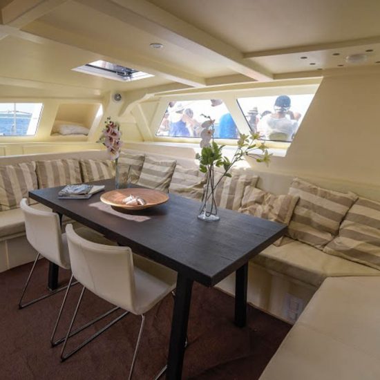 sunset boat charters interior of the pacific breeze catamaran for rent in puerto morelos, riviera maya, mexico