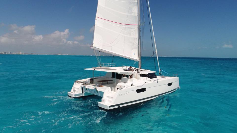 side view of a saona 47 catamaran tour in cancun and isla mujeres mexico