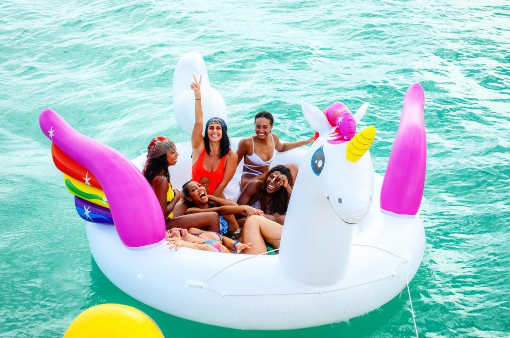 girls bachelorette party on floaties emma catamaran riviera maya catamarans