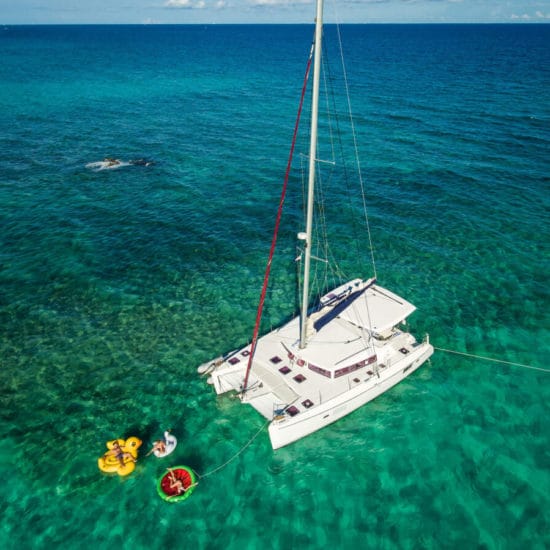 Luxury private catamaran rental in playa del carmen, riviera maya, mexico.
