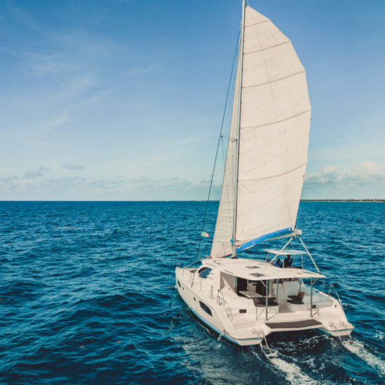 how to vacation in tulum, rent a catamaran