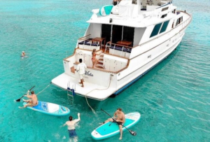 Your private yacht with paddle boards