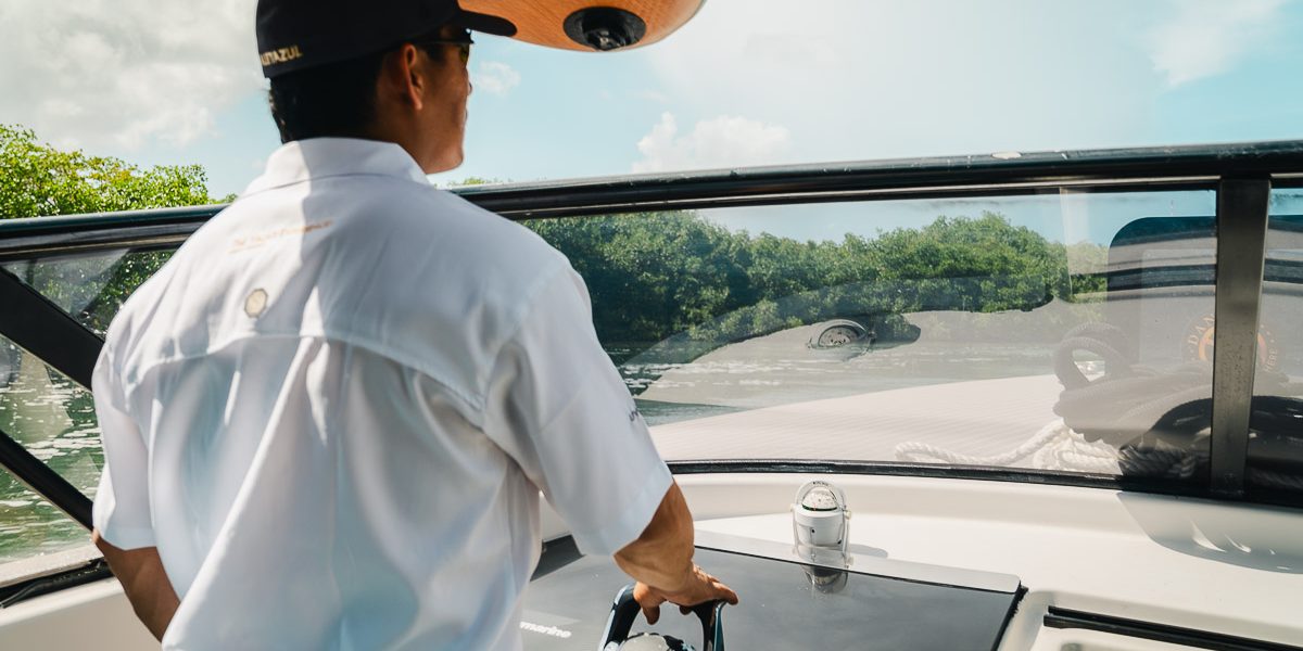 Captian on rental yacht in Cancun, Mexico