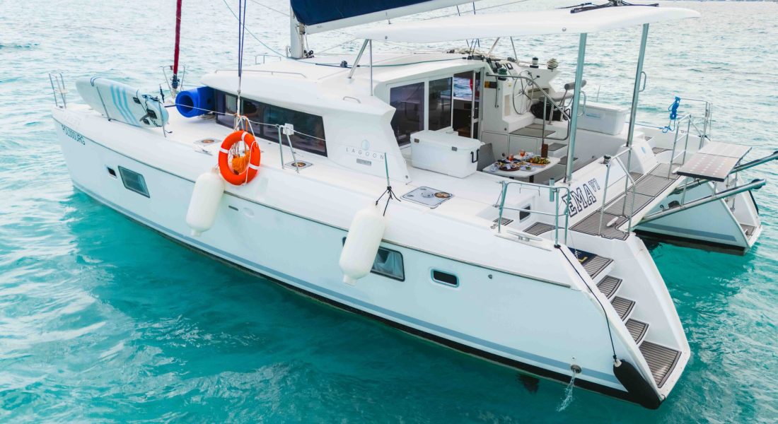 Group sailing in Cancun on a Private Catamaran