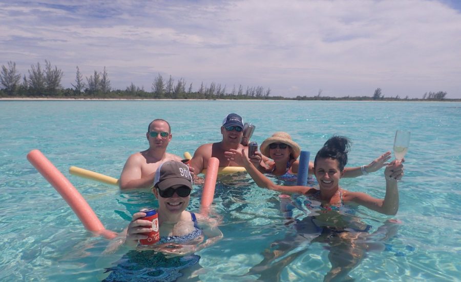 people swimming with champagne in cozumel private charter, riviera maya, mexico