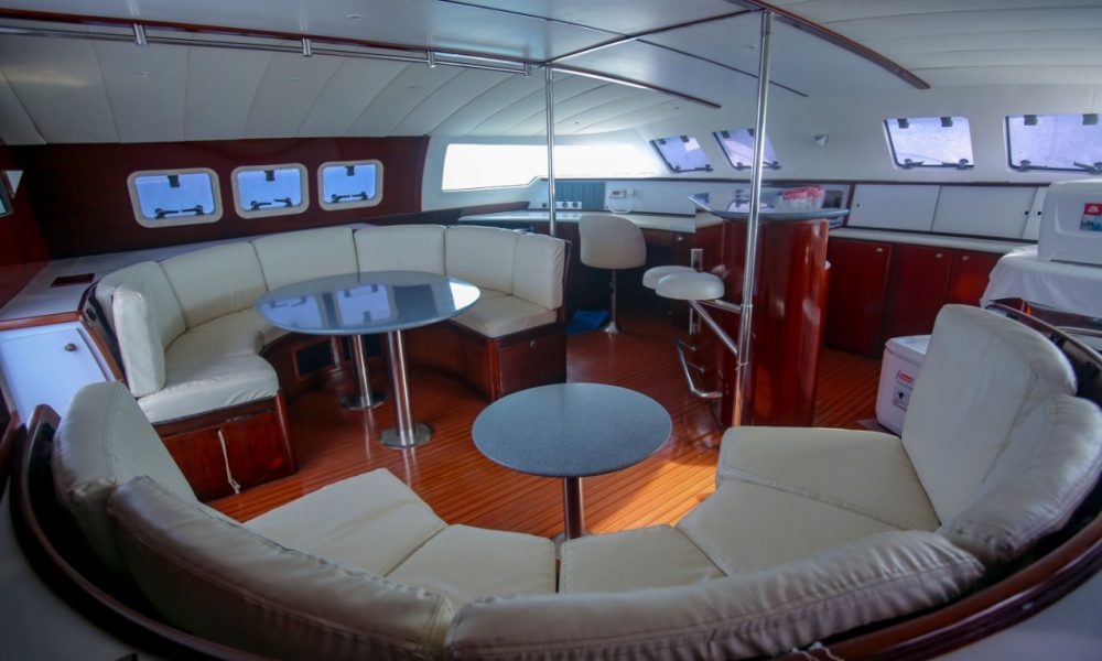 interior couches of a catamaran for rent in cancun mexico