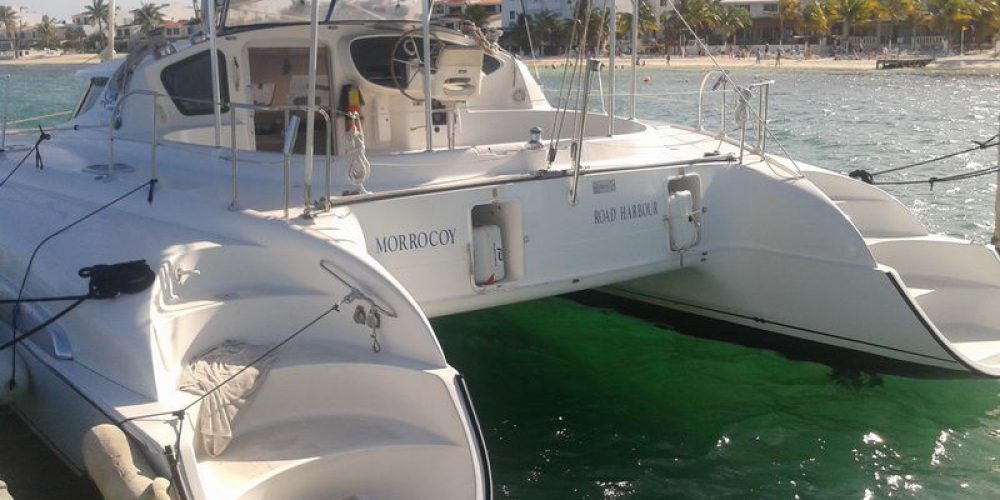 rear view of morrocoy private catamaran rental for cruiships in cozumel, mexico